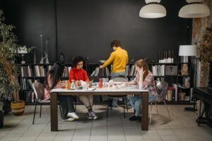 colleagues working at the same desk togther