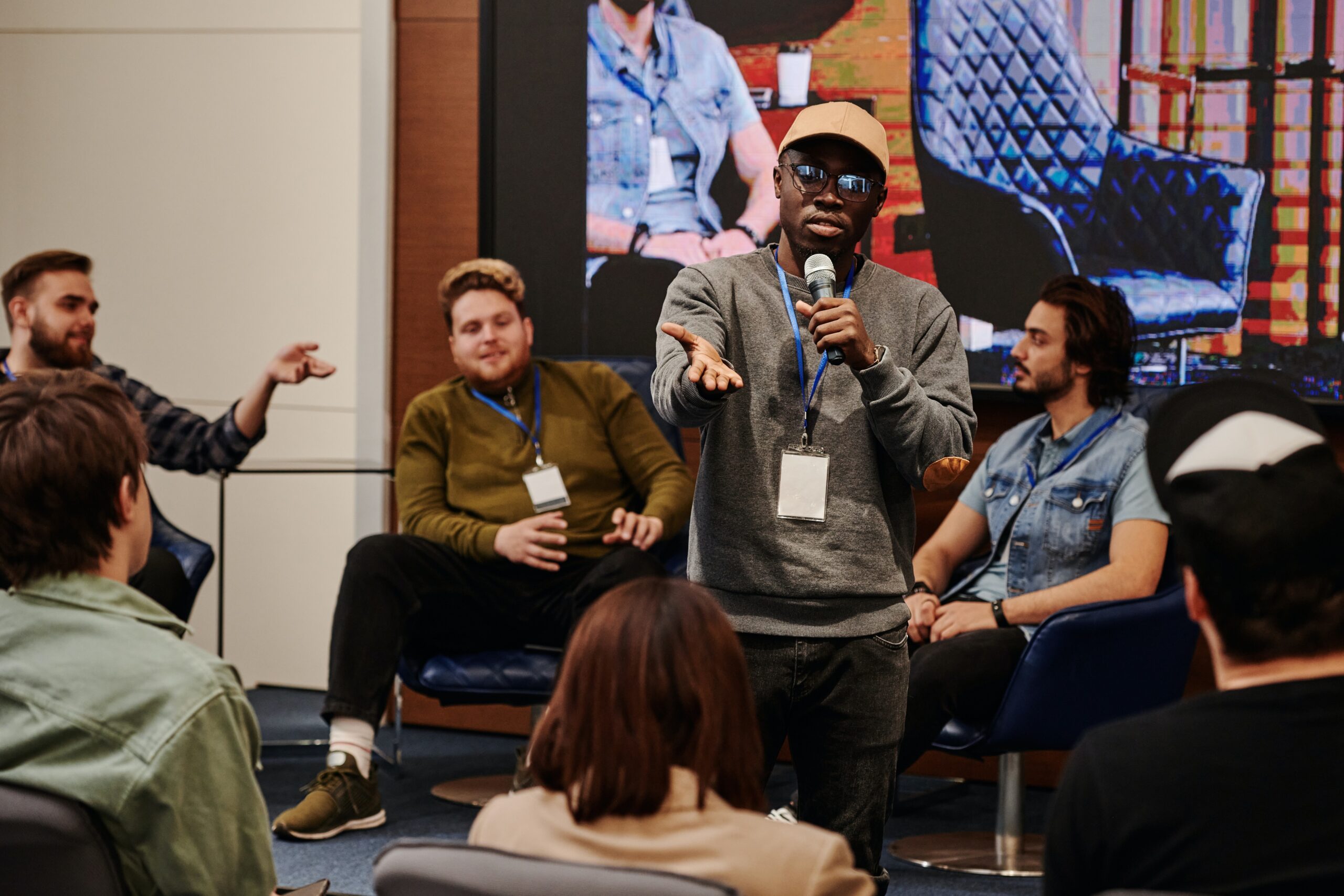 a man confidently presenting to an audience